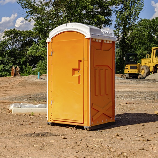 how often are the porta potties cleaned and serviced during a rental period in Winner